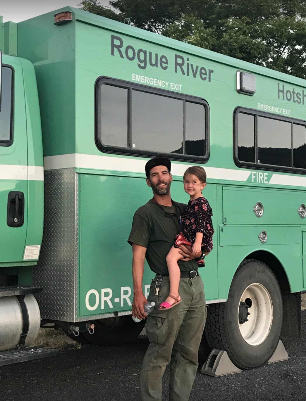 Luke Mayfield with his daughter during his time on a Hotshot crew in Rogue River, Oregon