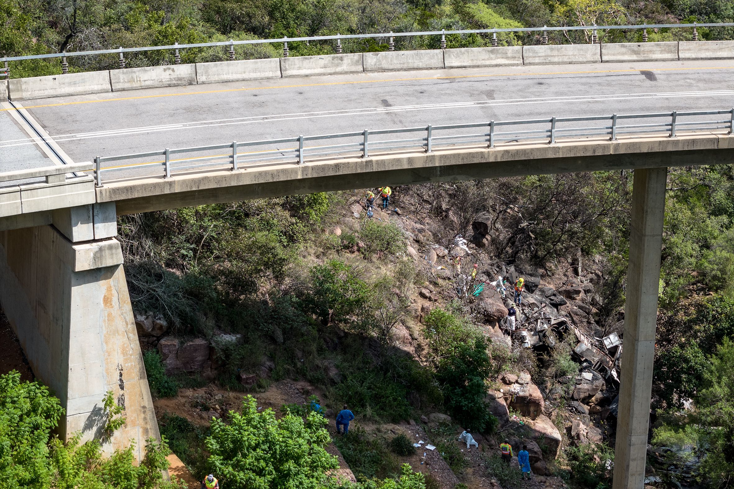 A drone picture shows rescuers working at the site of the bus crash near Mamatlakala in Limpopo province, South Africa