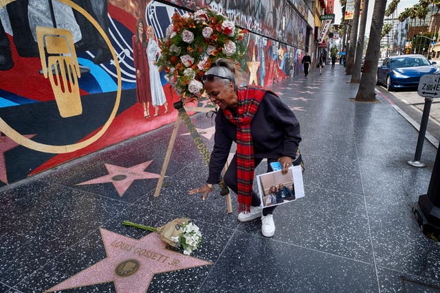 Miriam Holder Jacobs, a former personal assistant to Louis Gossett Jr, pays her respects (Richard Vogel/AP)