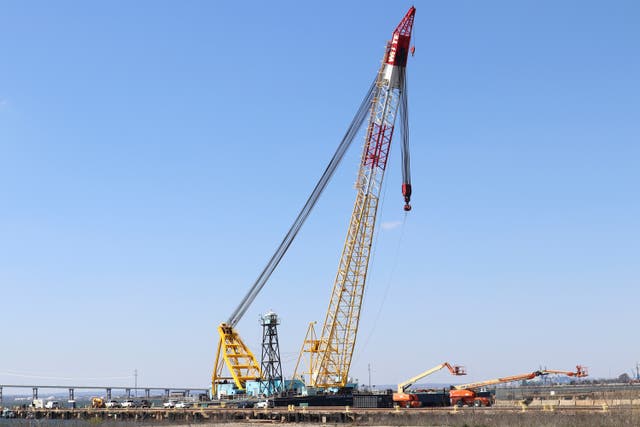 <p>The Chesapeake 1000 crane, which will be used to help remove wreckage from the collapse of the Key Bridge, is docked at Tradepoint Atlantic in Sparrows Point</p>