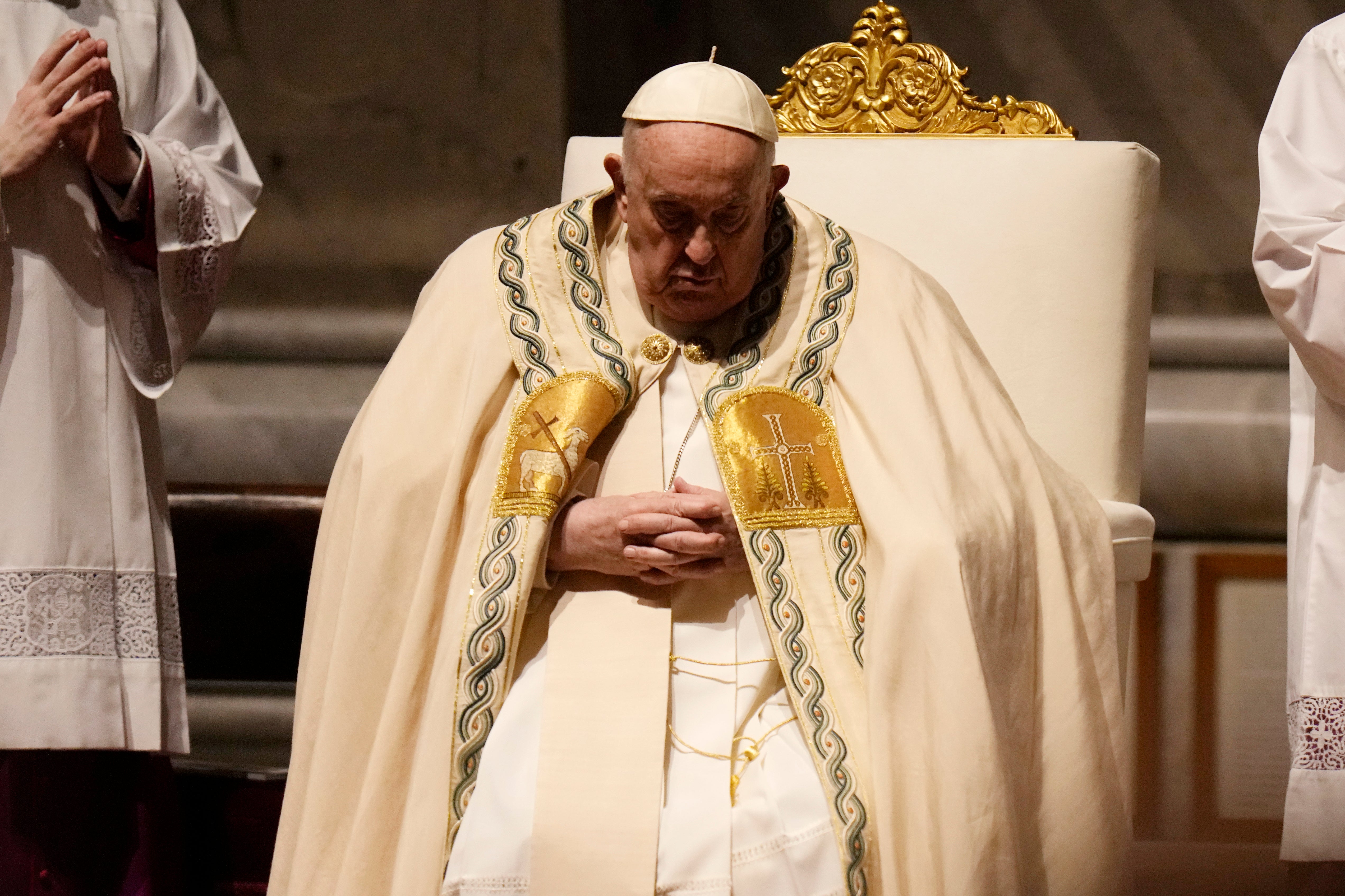 The Pope prays in St Peter’s Basilica on Saturday