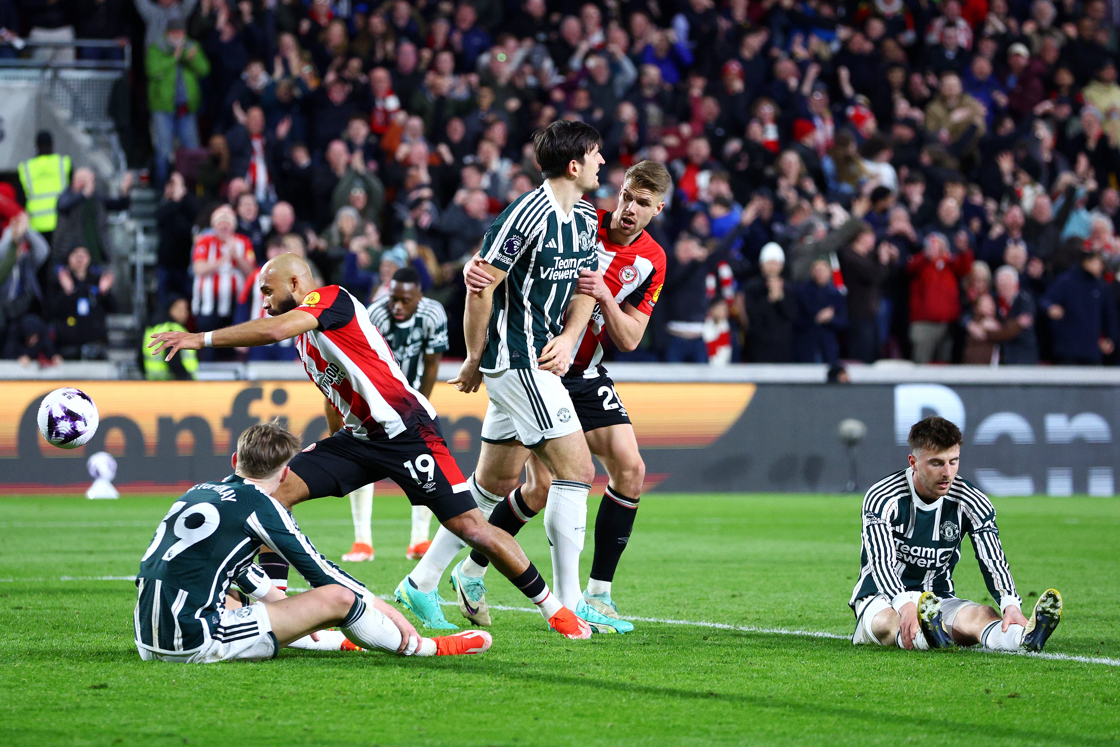 Brentford scored late to snatch a draw from a wild game
