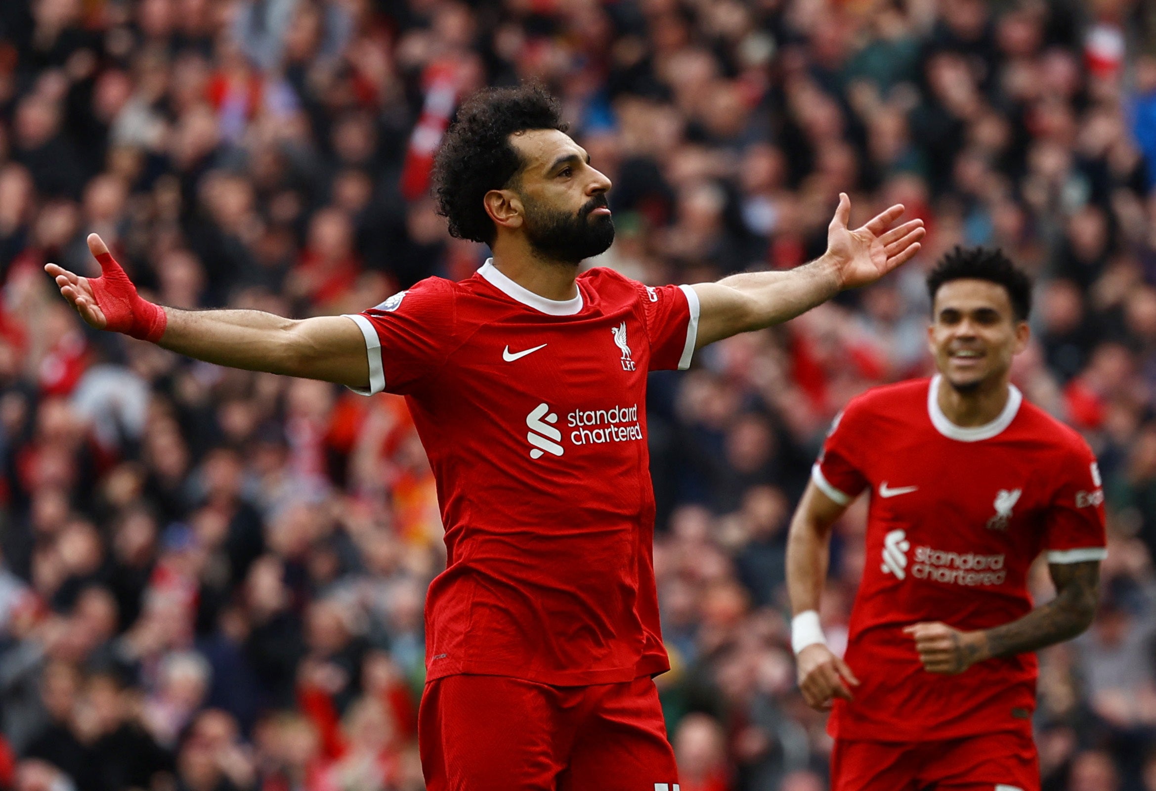 Liverpool 2-1 Brighton: Salah's strike secures vital win for Reds