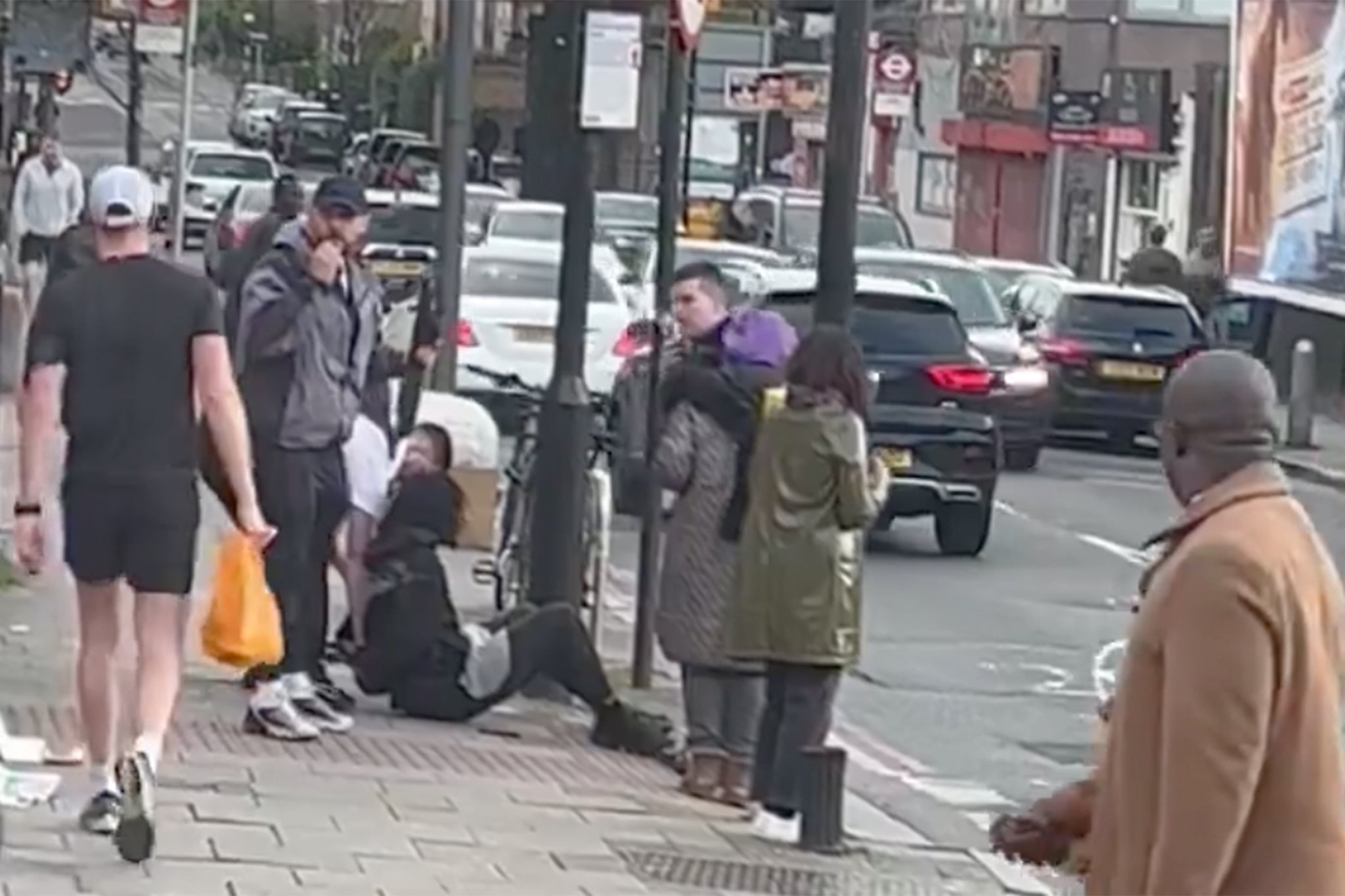 Footage on social media showed the suspect sitting on the floor and handcuffed outside Clapham North station