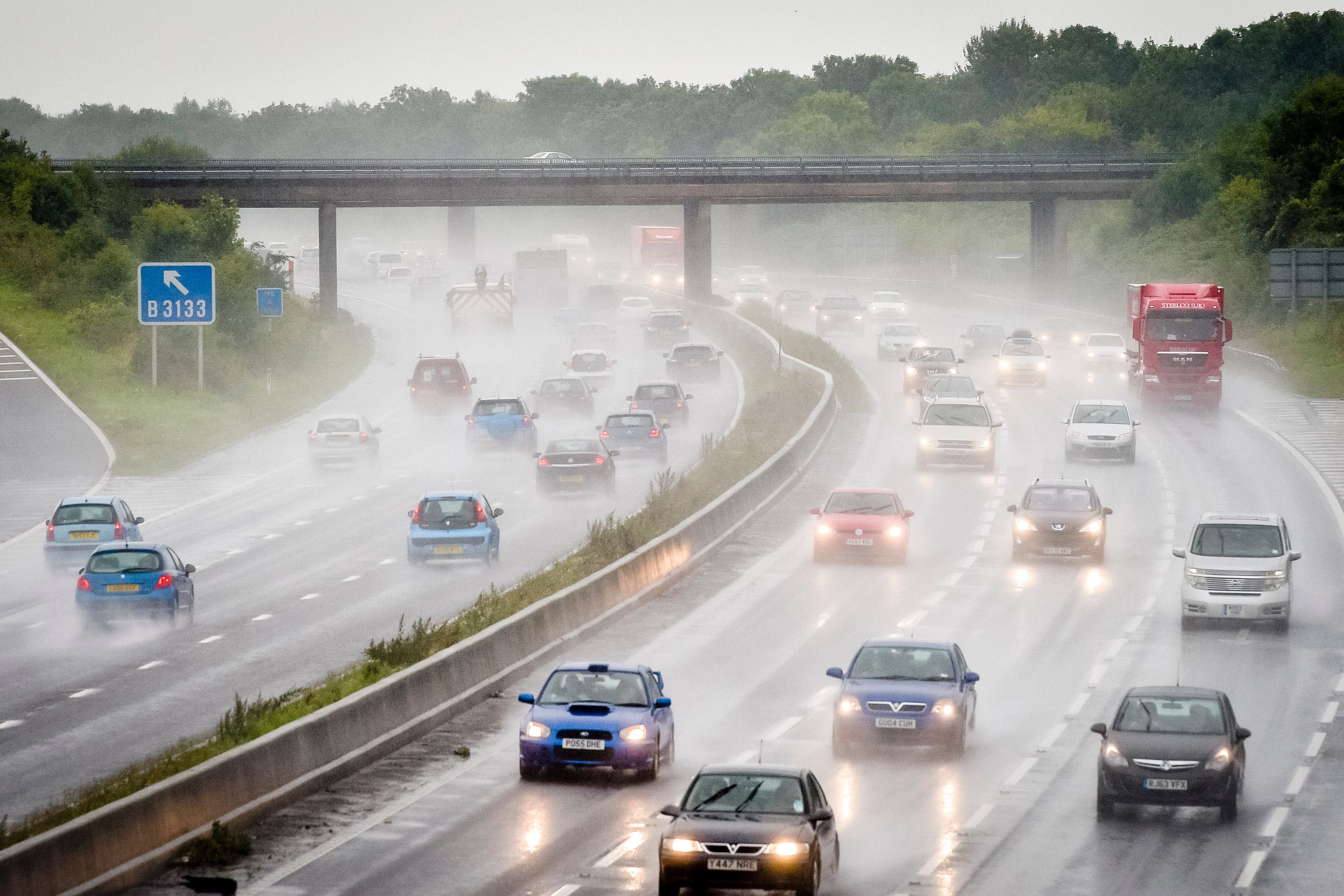 Traffic and heavy spray on the M5 Motorway in Somerset