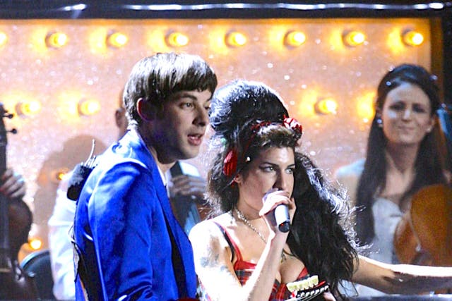 <p>Amy Winehouse and Mark Ronson on stage, during the BRIT Awards 2008, at Earls Court in central London.</p>