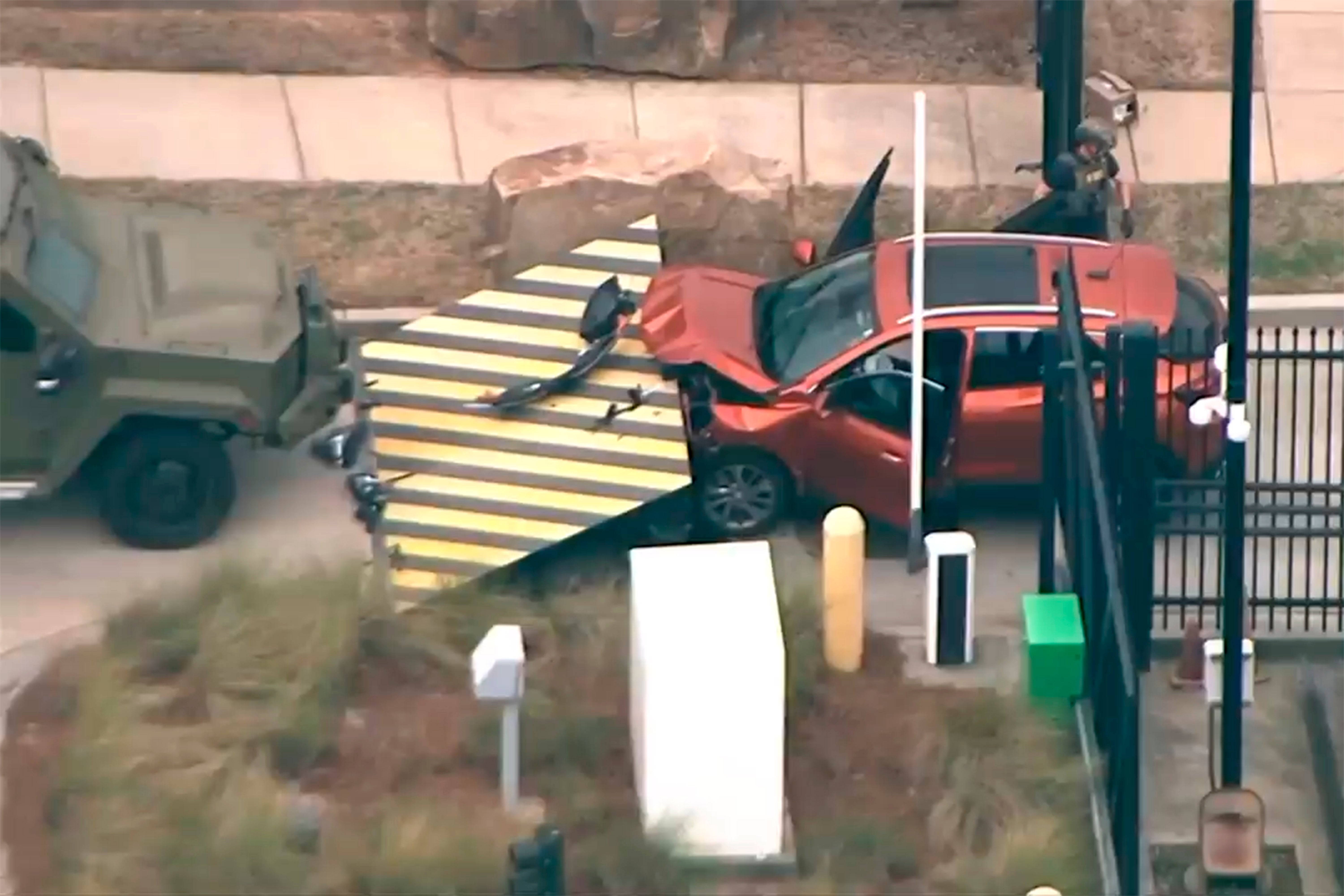 Vehicle Hits FBI Gate