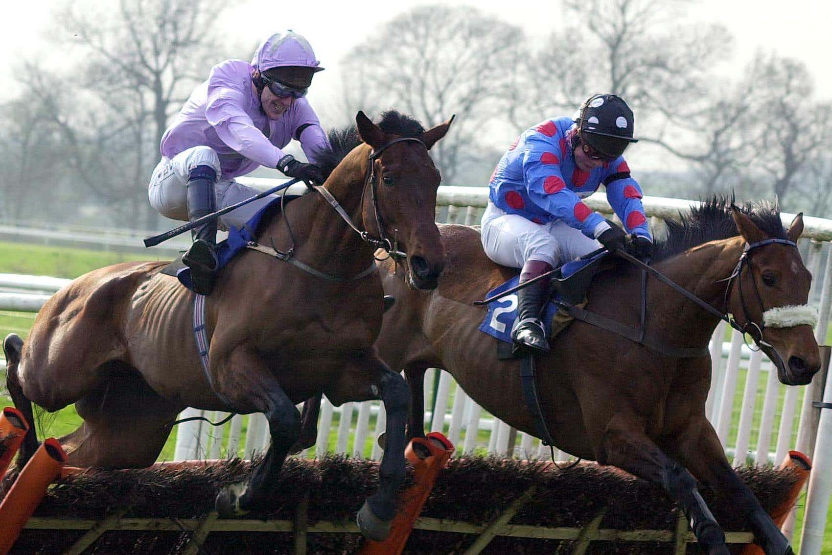 Valfonic ridden by AP McCoy (left) on the way to a record win (Rui Vieira/PA)