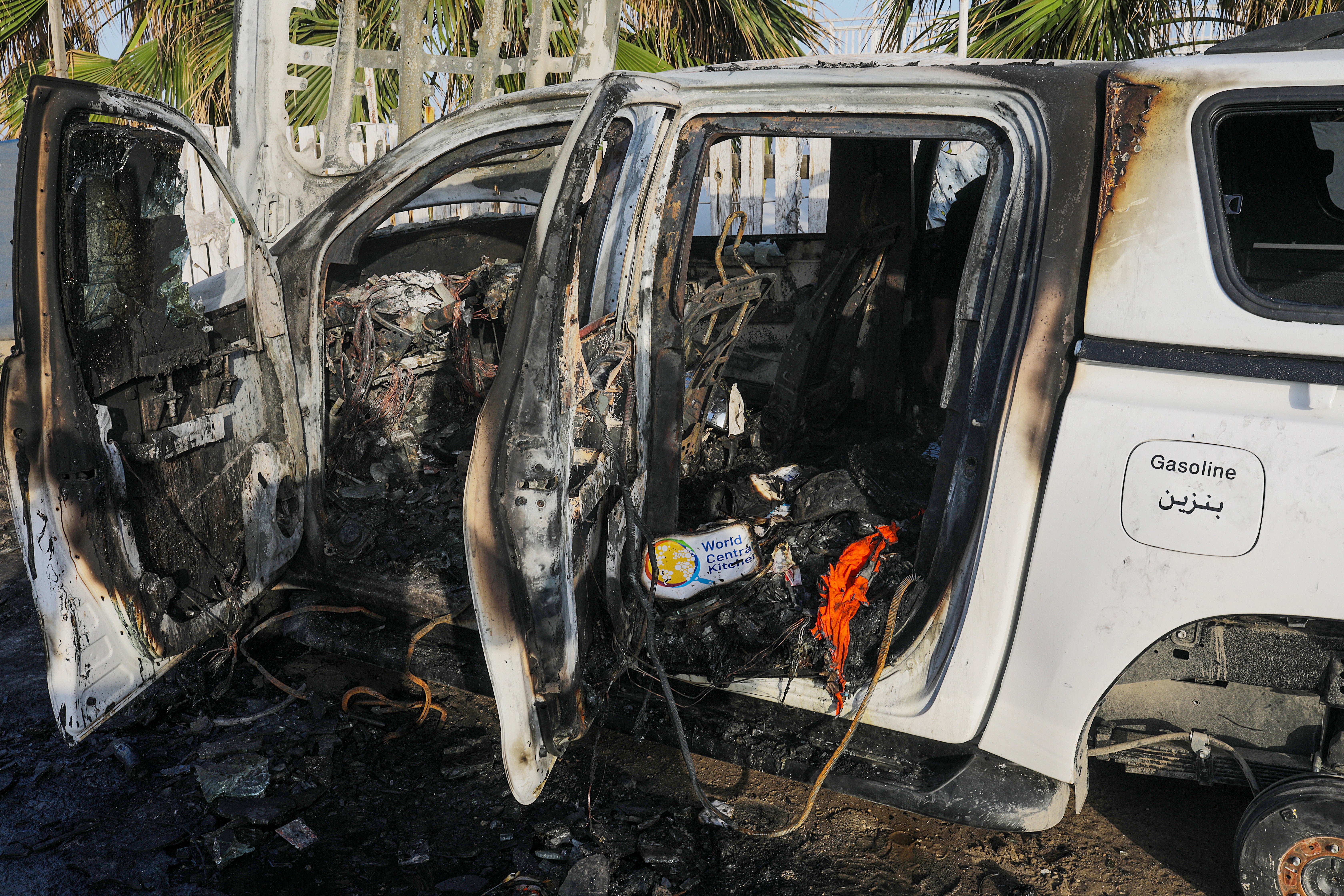 The burnt remains of the convoy car hit by by Israeli missiles on Monday night