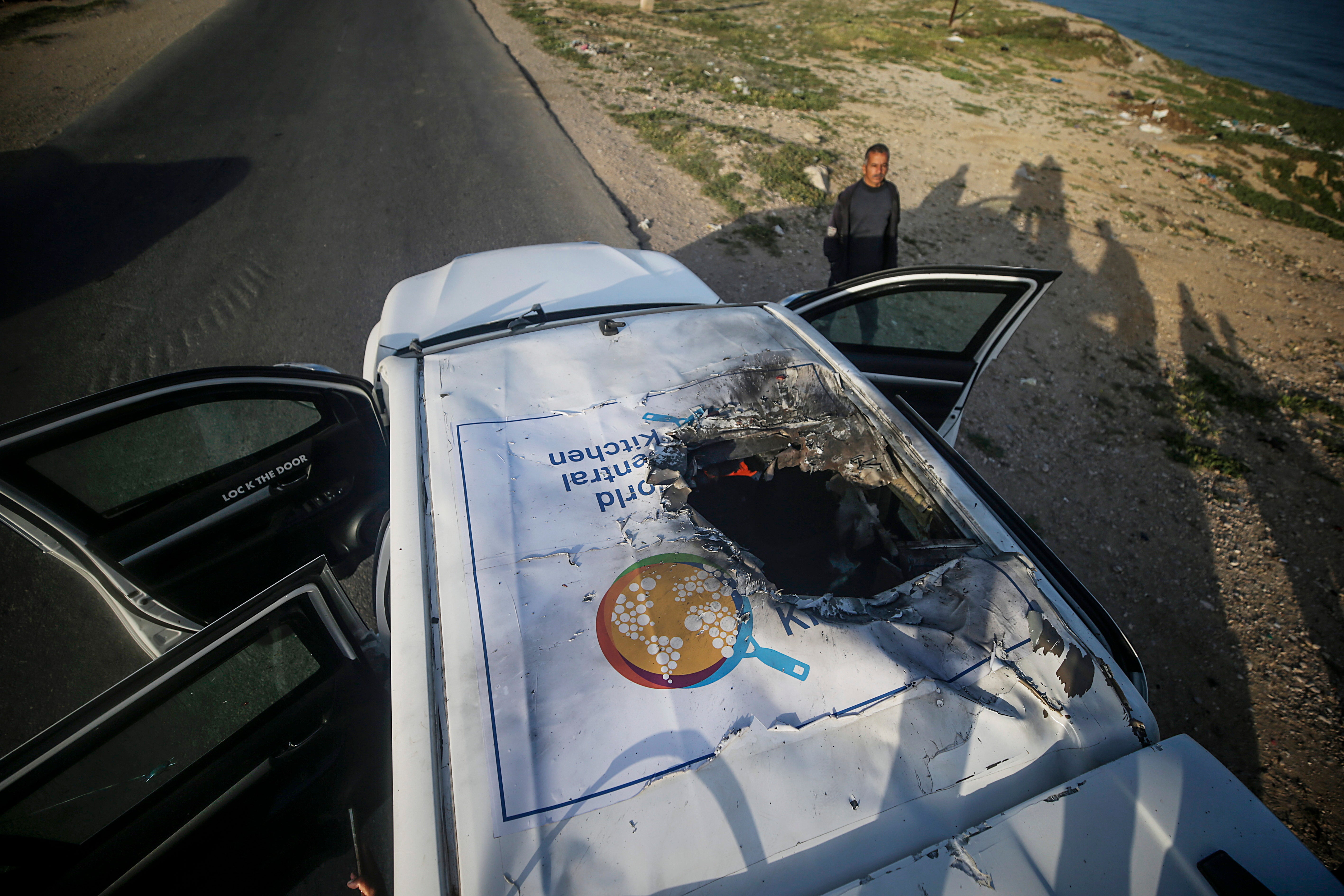 The remains of a vehicle belonging to World Central Kitchen on the road between Deir al-Balah and Khan Younis in the southern Gaza Strip