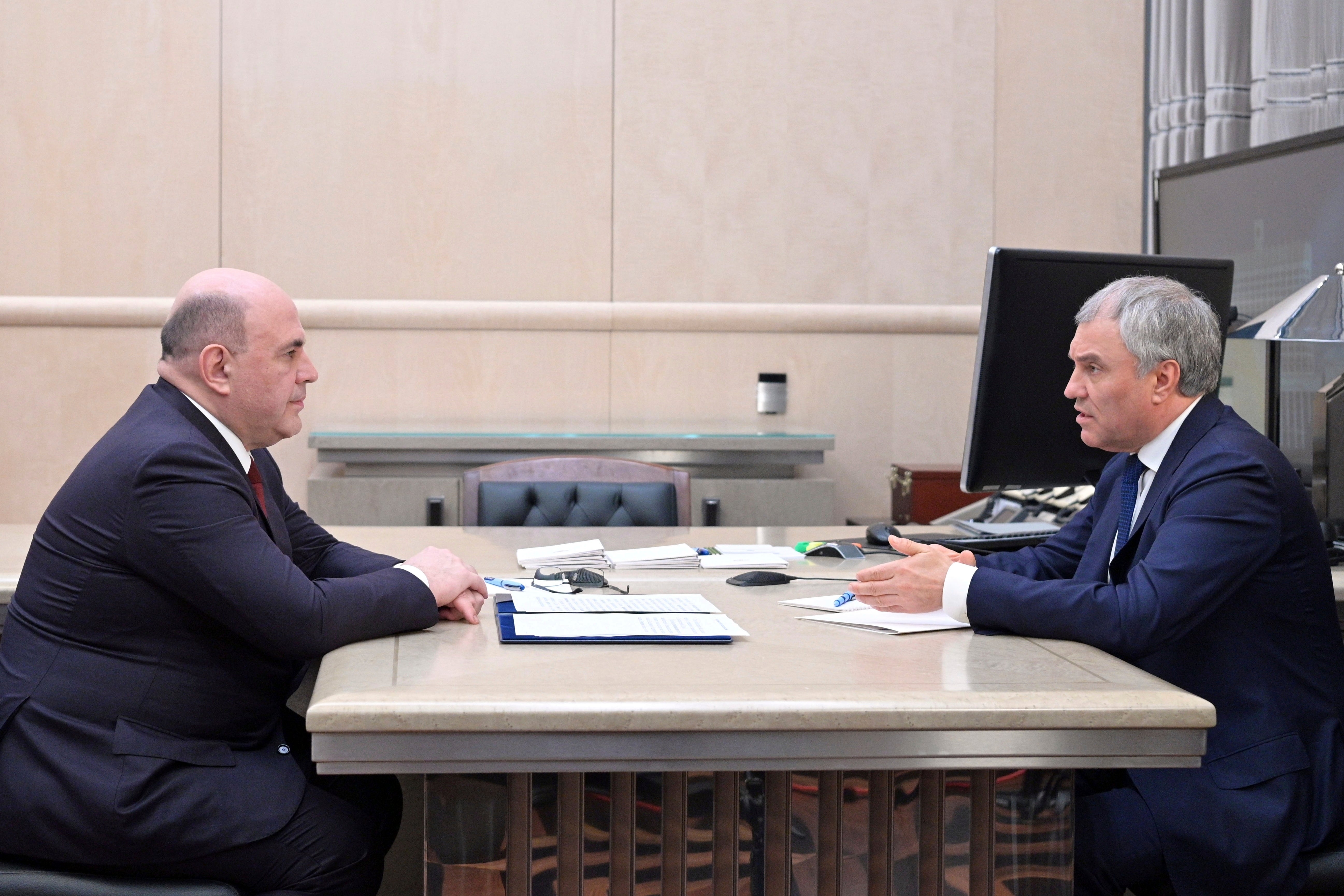 Russian Prime Minister Mikhail Mishustin (left) listens to Speaker of the State Duma and the Lower House of the Russian Parliament Vyacheslav Volodin during a meeting in Moscow, Russia, Tuesday, April 2, 2024