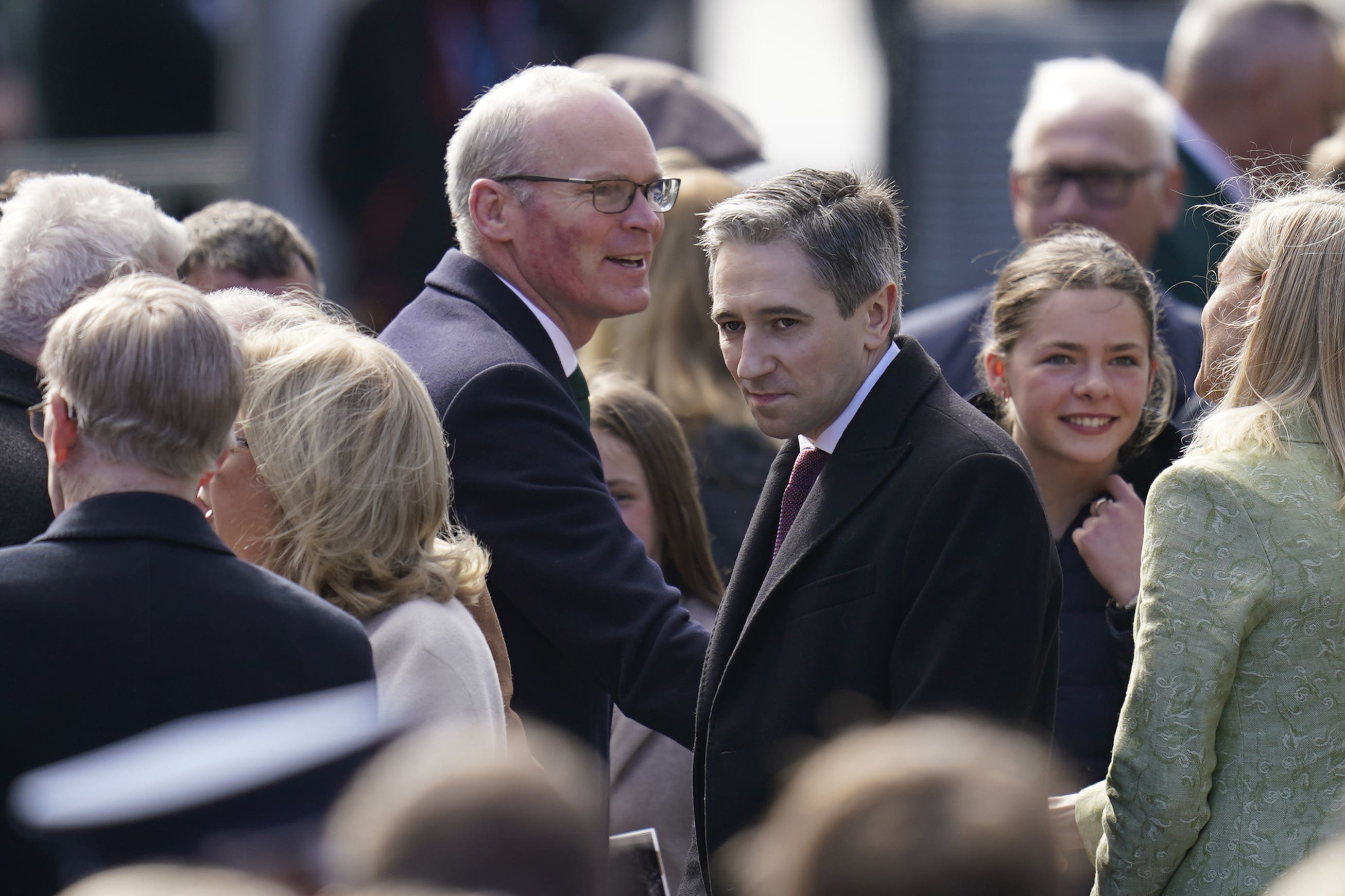 Simon Coveney, left, and Simon Harris (Niall Carson/PA)