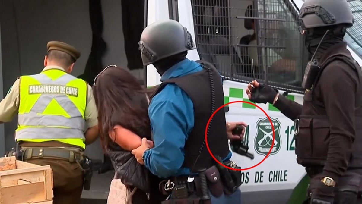 Moment woman takes gun from guard and shoots, injuring 3 in Chile