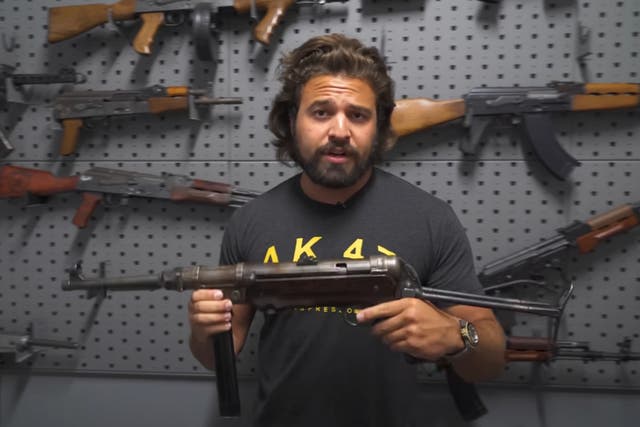 <p>Brandon Herrera appears in his YouTube video on the MP-40</p>