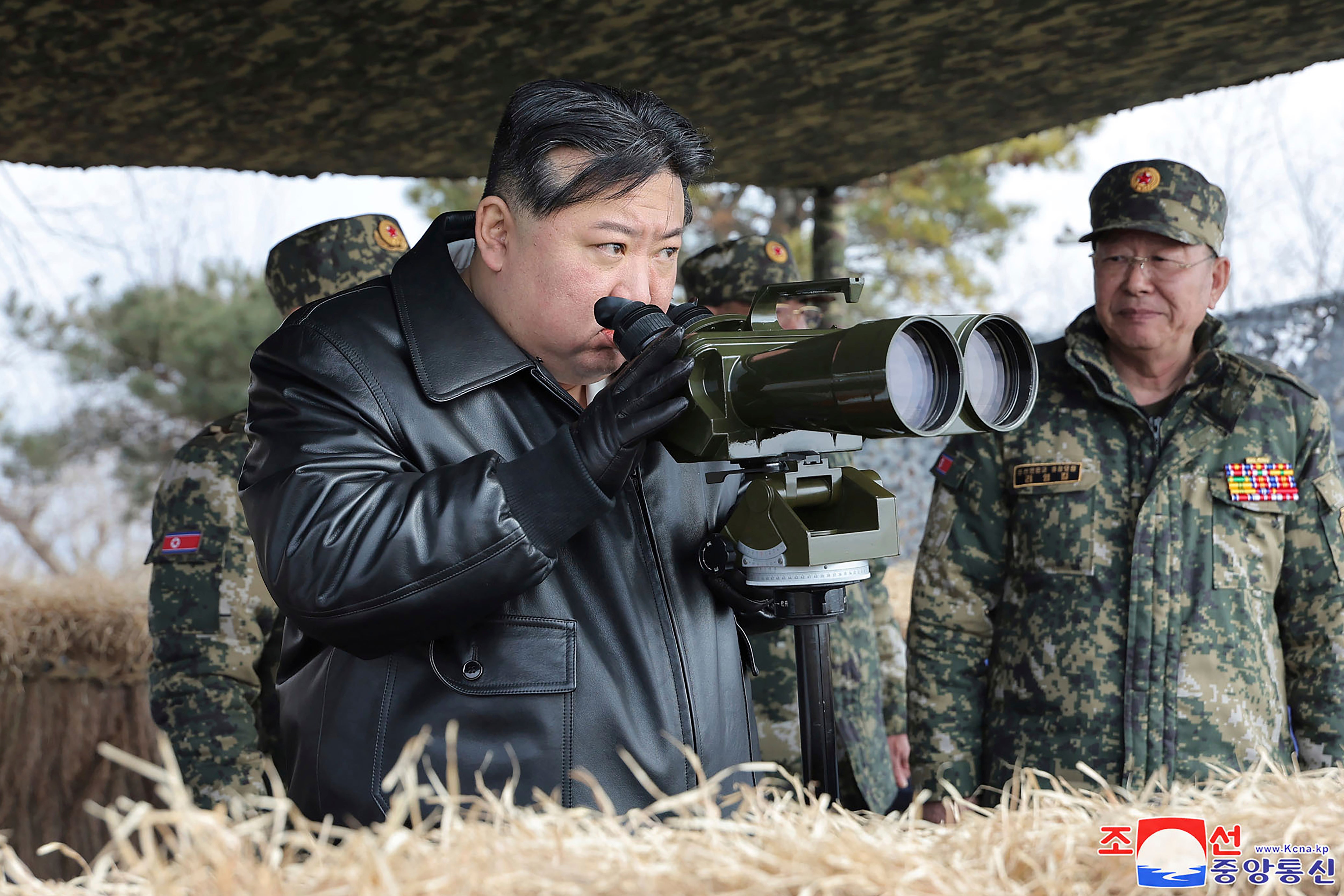 In this photo provided by the North Korean government, North Korean leader Kim Jong Un supervises artillery firing drills in North Korea on 7 March 2024