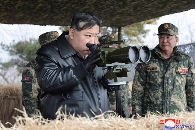 <p>In this photo provided by the North Korean government, North Korean leader Kim Jong Un supervises artillery firing drills in North Korea on 7 March 2024</p>