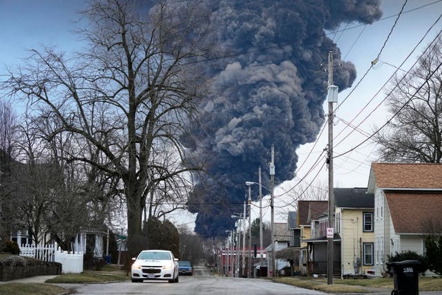 <p>A black plume rises over East Palestine, Ohio, as a result of a controlled detonation of a portion of the derailed Norfolk Southern trains</p>