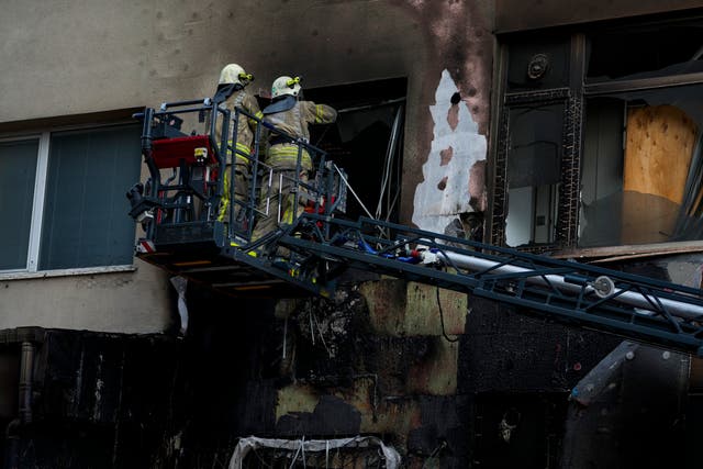 <p>Firefighters work in the aftermath of a fire in a nightclub in Istanbul, Turkey</p>