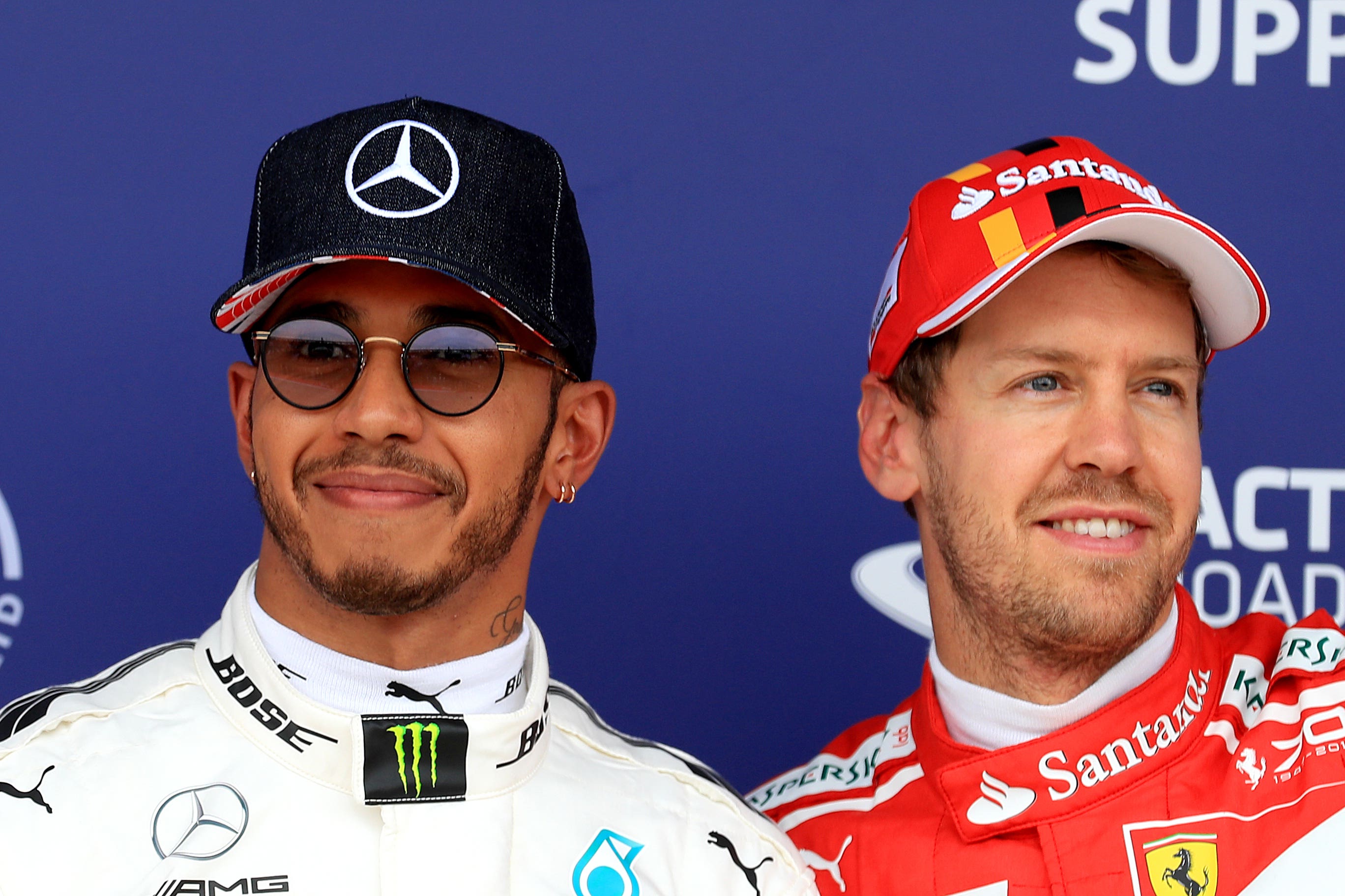Mercedes’ Lewis Hamilton (left) has tipped Sebastian Vettel as his potential replacement