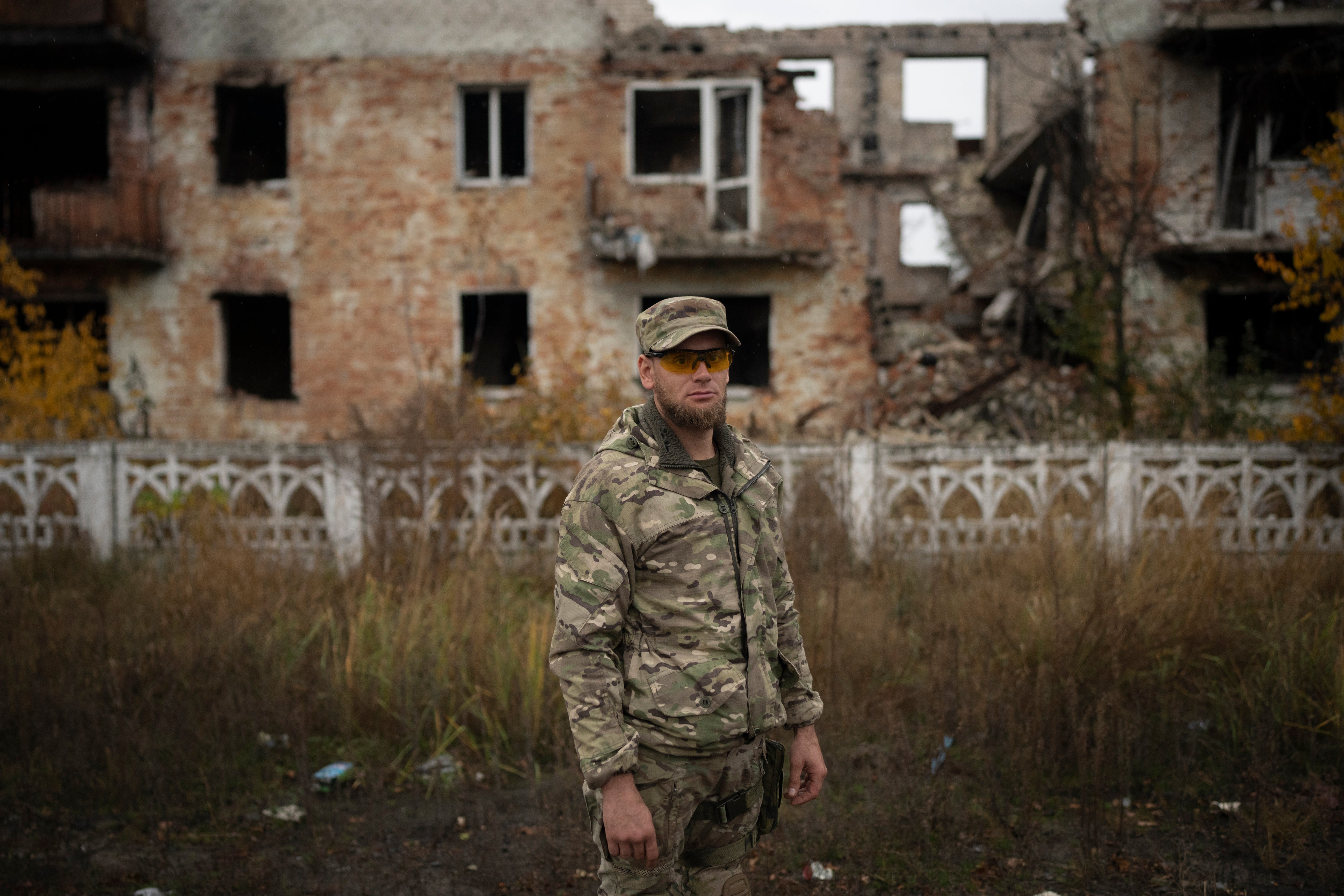 Oleksii Yukov, a Ukrainian body collector, stands for a portrait in the Sloviansk region