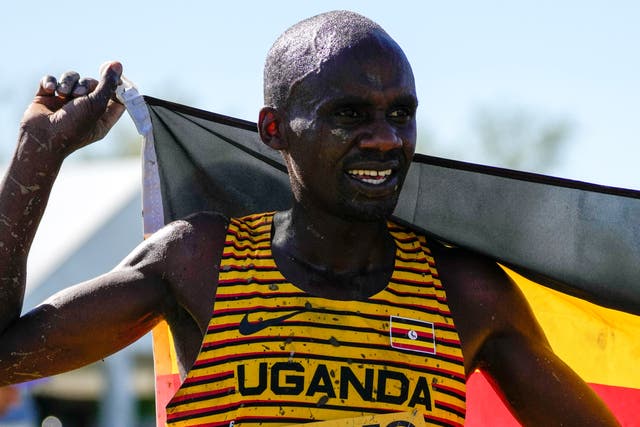 <p>Jacob Kiplimo of Uganda celebrates as he won the men's senior race during the World Athletics Cross Country Championships in Belgrade, Serbia</p>