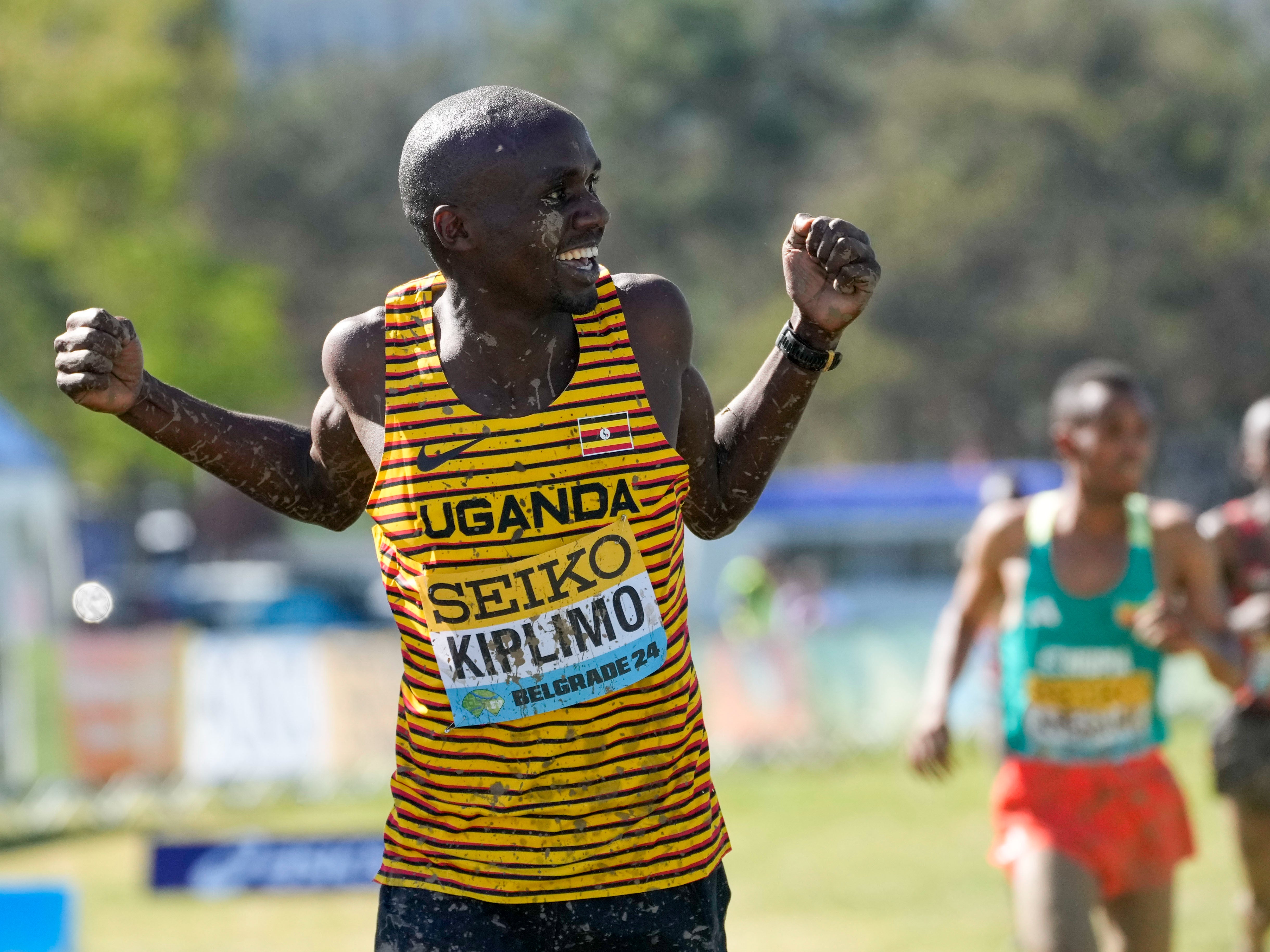 Jacob Kiplimo of Uganda celebrates after wins the men's senior race