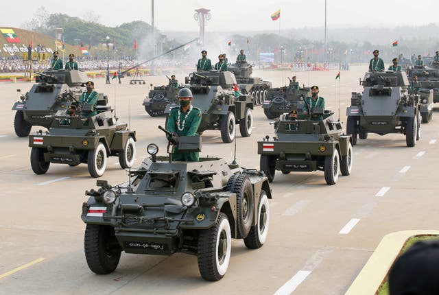 <p>Military personnel participates in a parade on Armed Forces Day in Naypyitaw, Myanmar, March 27, 2021</p>