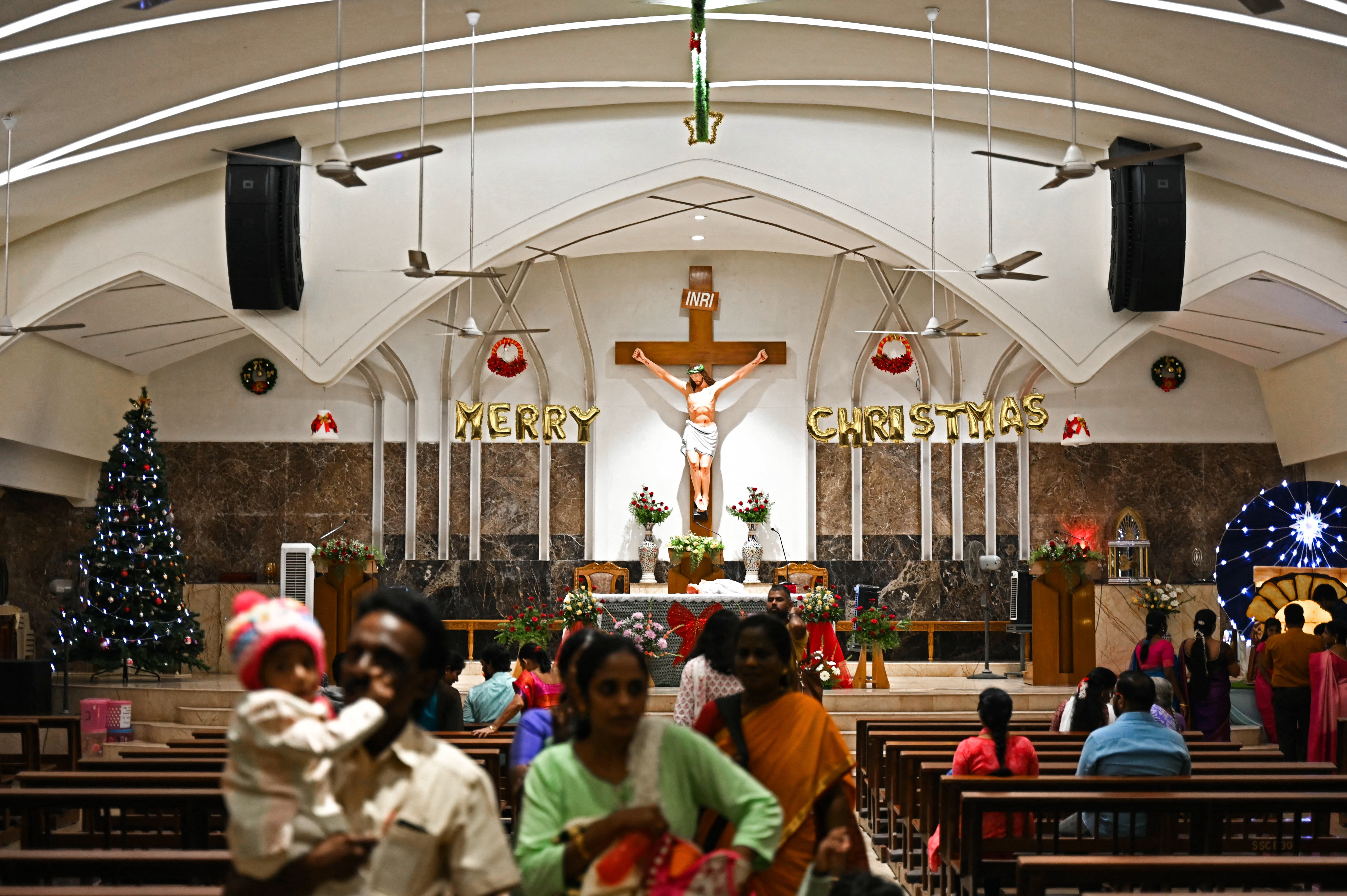 Christian devotees gather for a mass at a church in Chennai