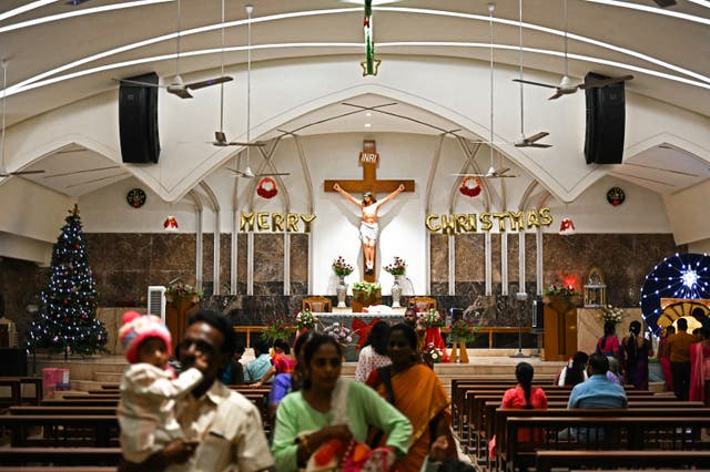 <p>Christian devotees gather for a mass at a church in Chennai</p>