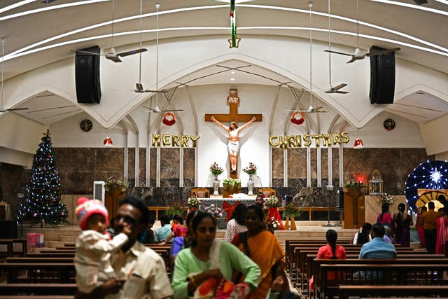 <p>Christian devotees gather for a mass at a church in Chennai</p>