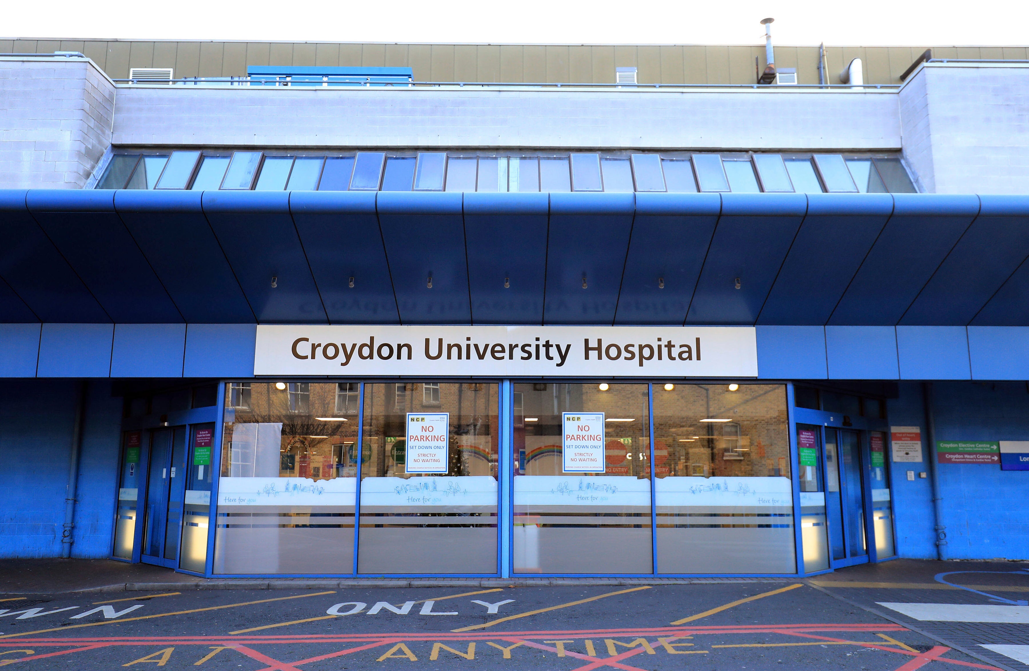 Parts of Croydon University Hospital were closed off after a woman was rushed to hospital over fears she had ingested poison