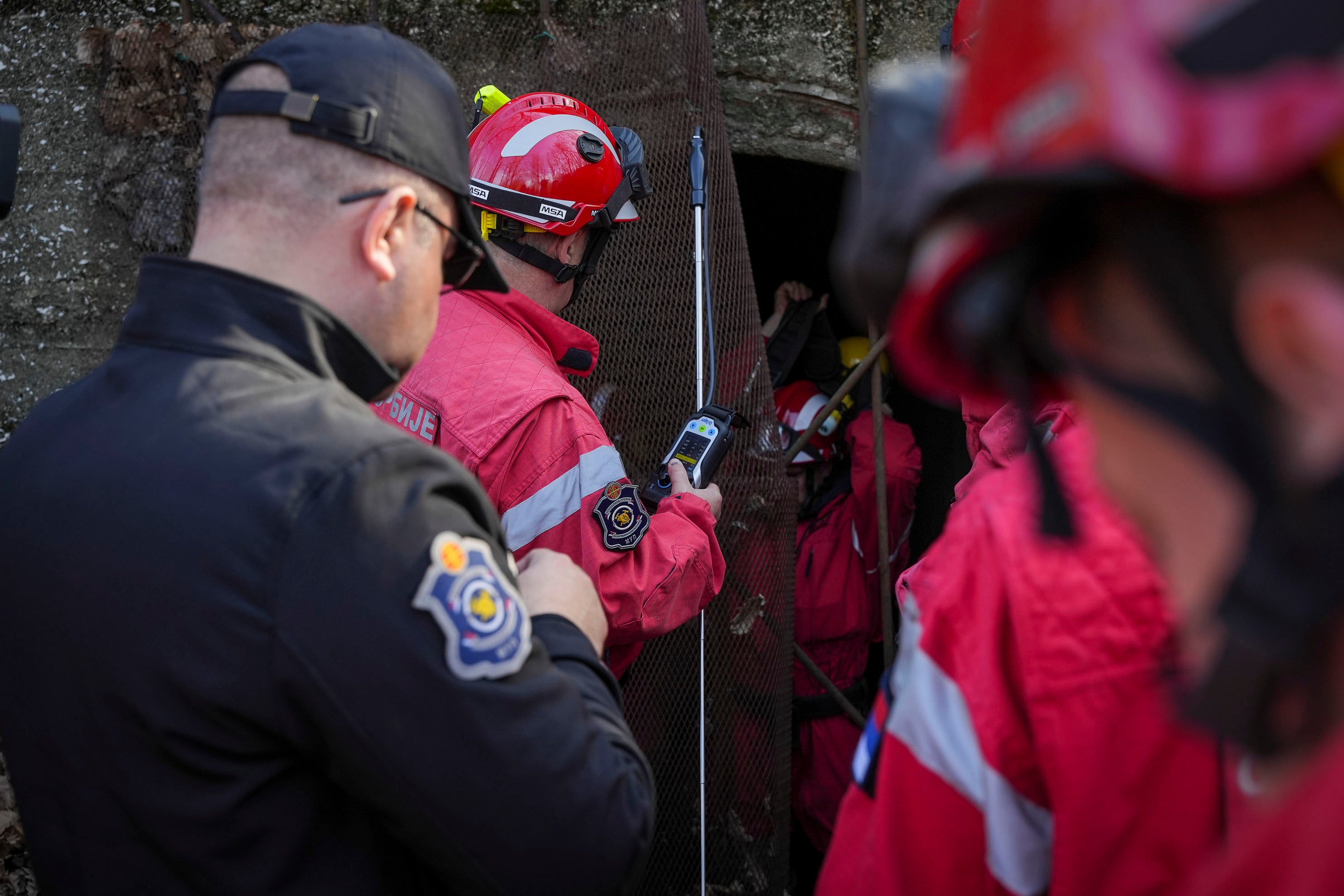 Serbian Police Rescue team search a forest near Bor, Serbia, Friday, March 29, 2024