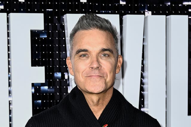 <p>Robbie Williams attends the launch of the Robbie Williams documentary in November 2023</p>