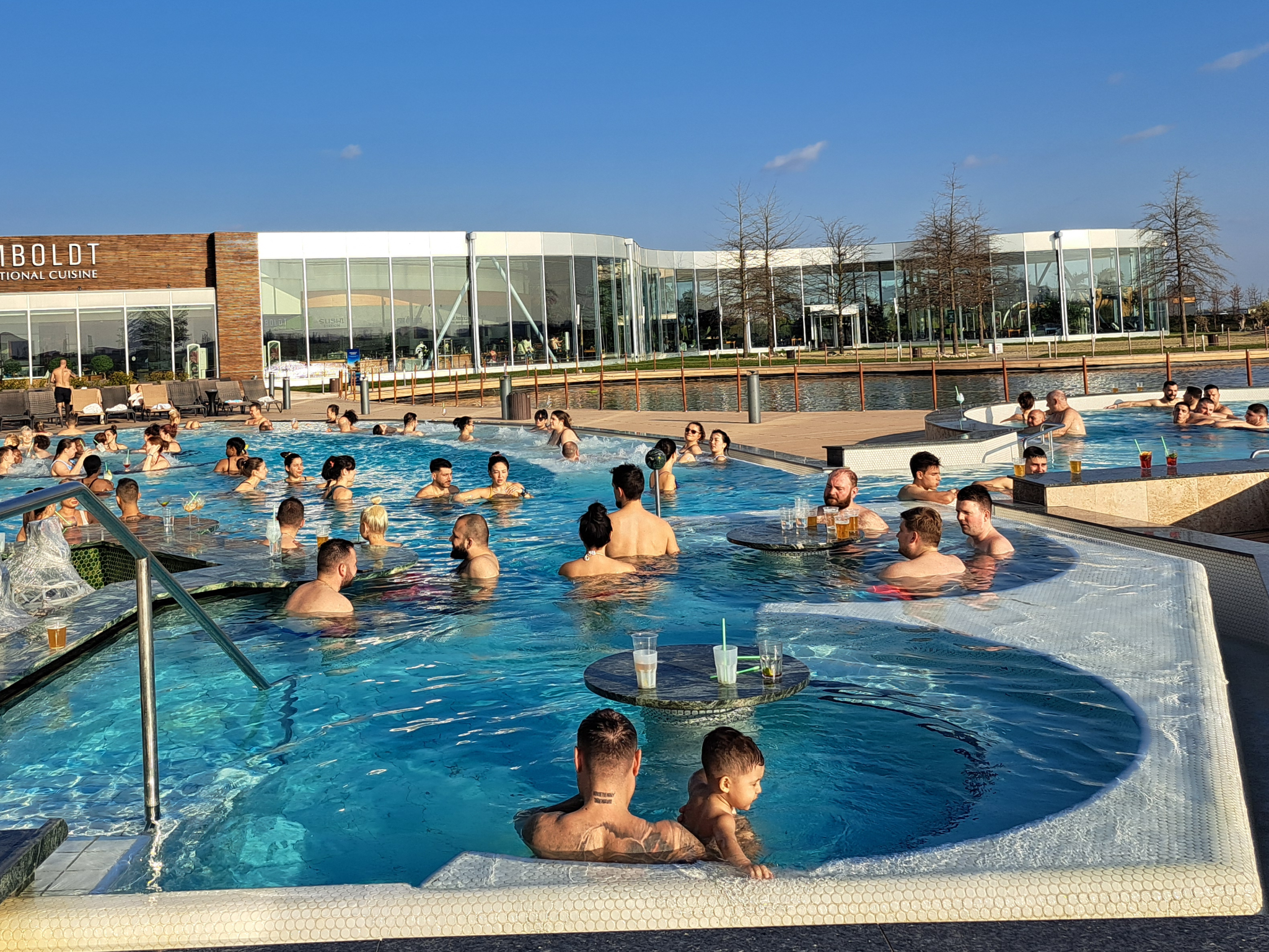 With seating and tables for drinks, the heated outdoor pool is a pleasant spot to relax