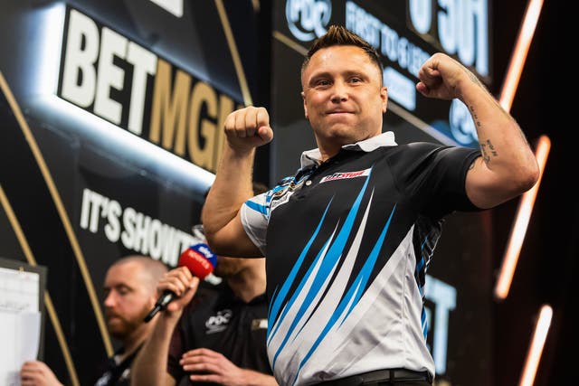 Gerwyn Price threw a nine-dart finish in the Premier League in Manchester (Taylor Lanning/PDC/PA)