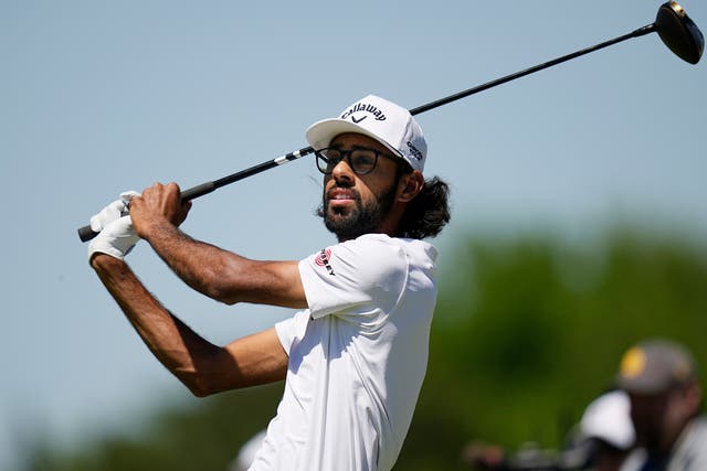 Akshay Bhatia watches his tee shot on the fourth hole during the first round of the Texas Open golf tournament (Eric Gay/AP)