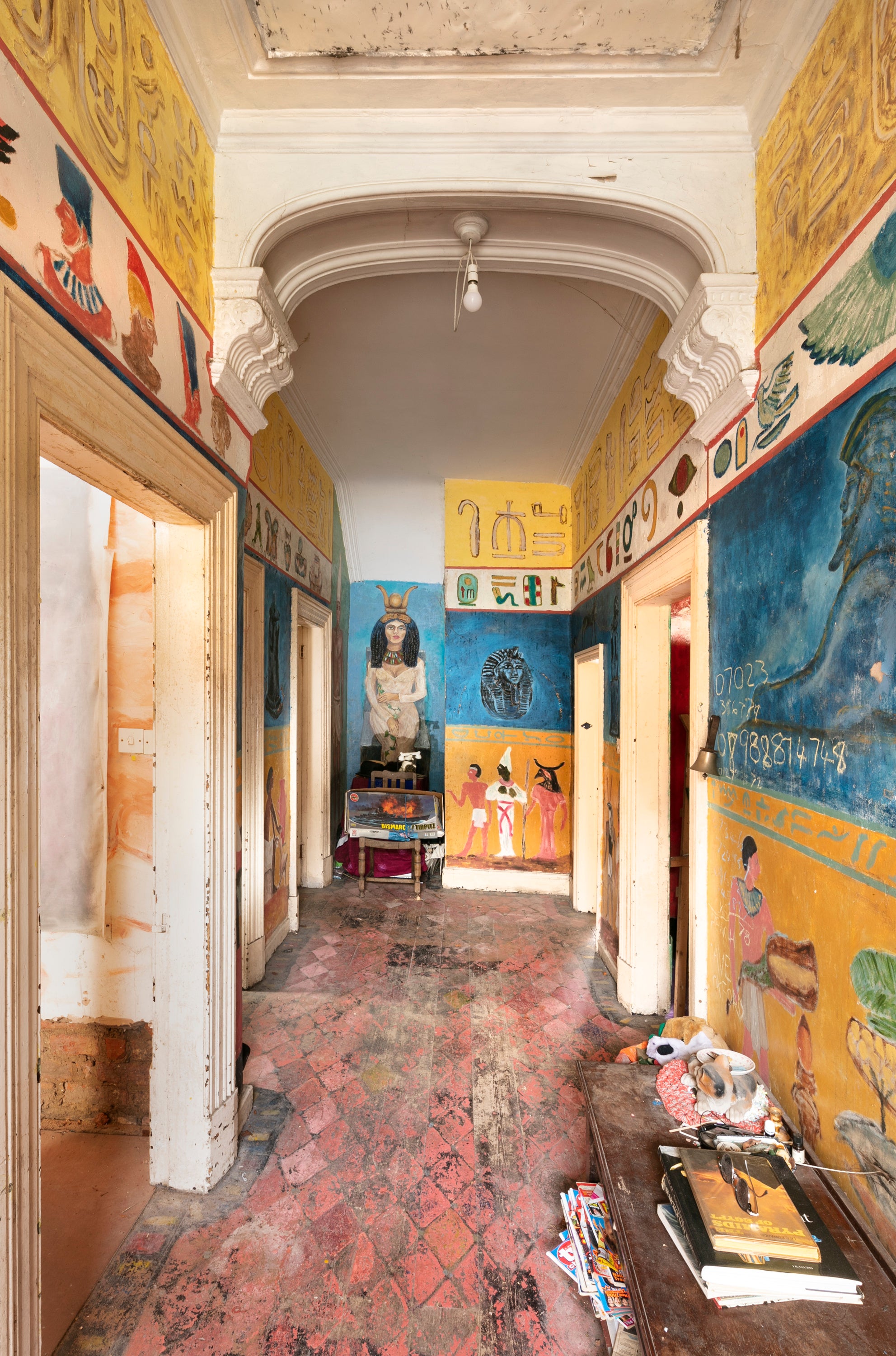 Gittins painted Egyptian, Greek and marine murals across the walls and ceiling