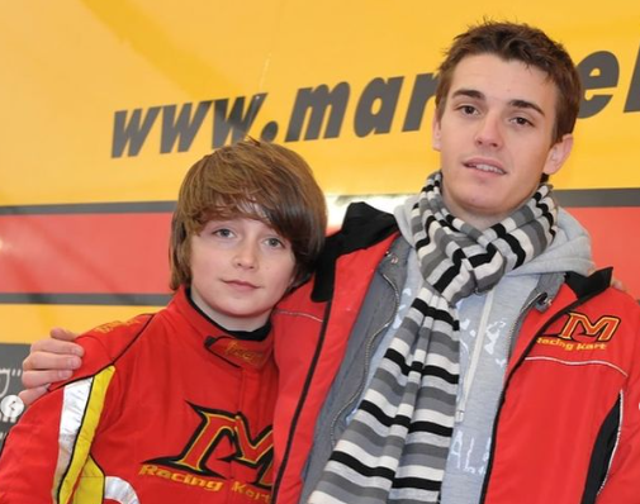 <p>Charles Leclerc as a junior karter alongside godfather Jules Bianchi</p>