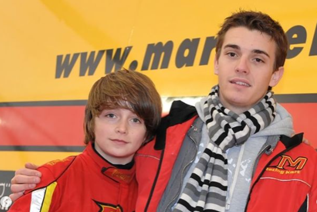 <p>Charles Leclerc as a junior karter alongside godfather Jules Bianchi</p>
