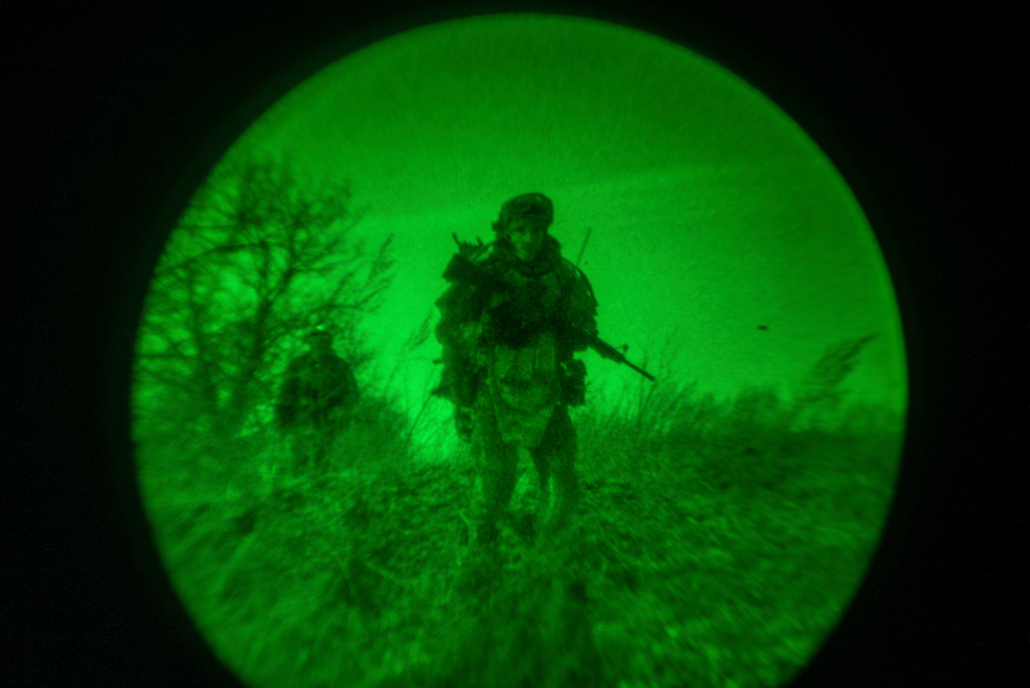 Ukrainian servicemen of the 3rd Assault brigade are seen through night vision goggles, or NVG, during a night mission on the frontline near Avdiivka last month