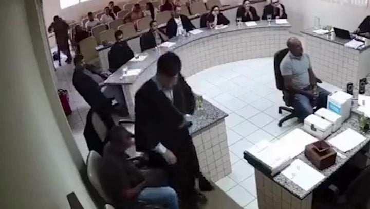 <p>Moment son shoots father’s accused killer six times in middle of courtroom caught on CCTV.</p>