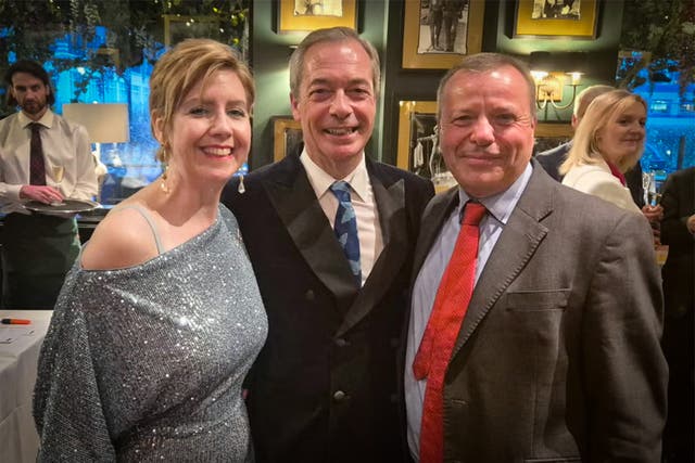 <p>Cheers! Nigel Farage at his birthday party with Aaron Banks, finger-flipping ex-minister Andrea Jenkyns... and who is that in the background? </p>