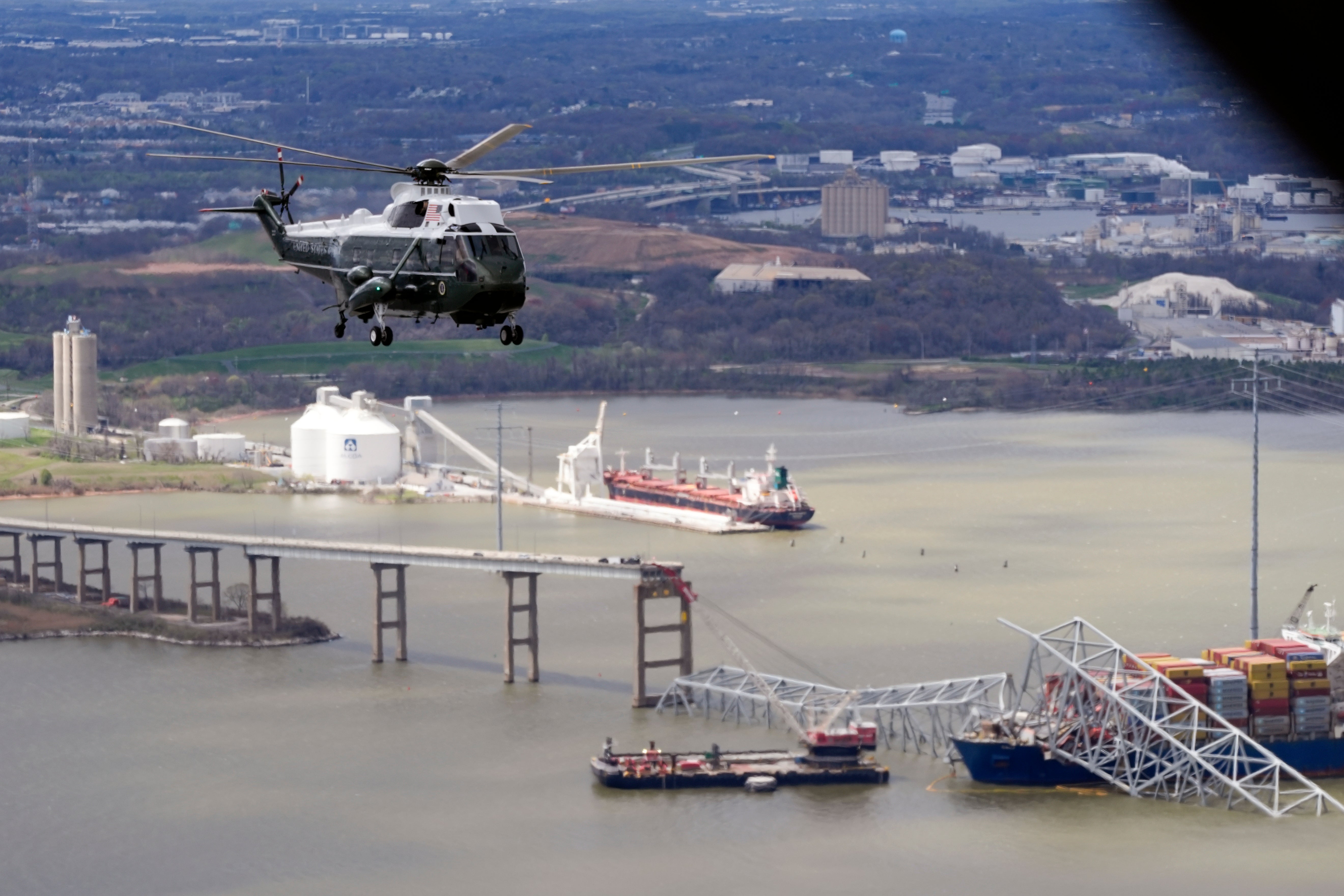 President Joe Biden, aboard Marine One, takes an aerial tour of the collapsed Francis Scott Key Bridge in Baltimore, Friday, April 5, 2024, as seen from an accompanying aircraft.