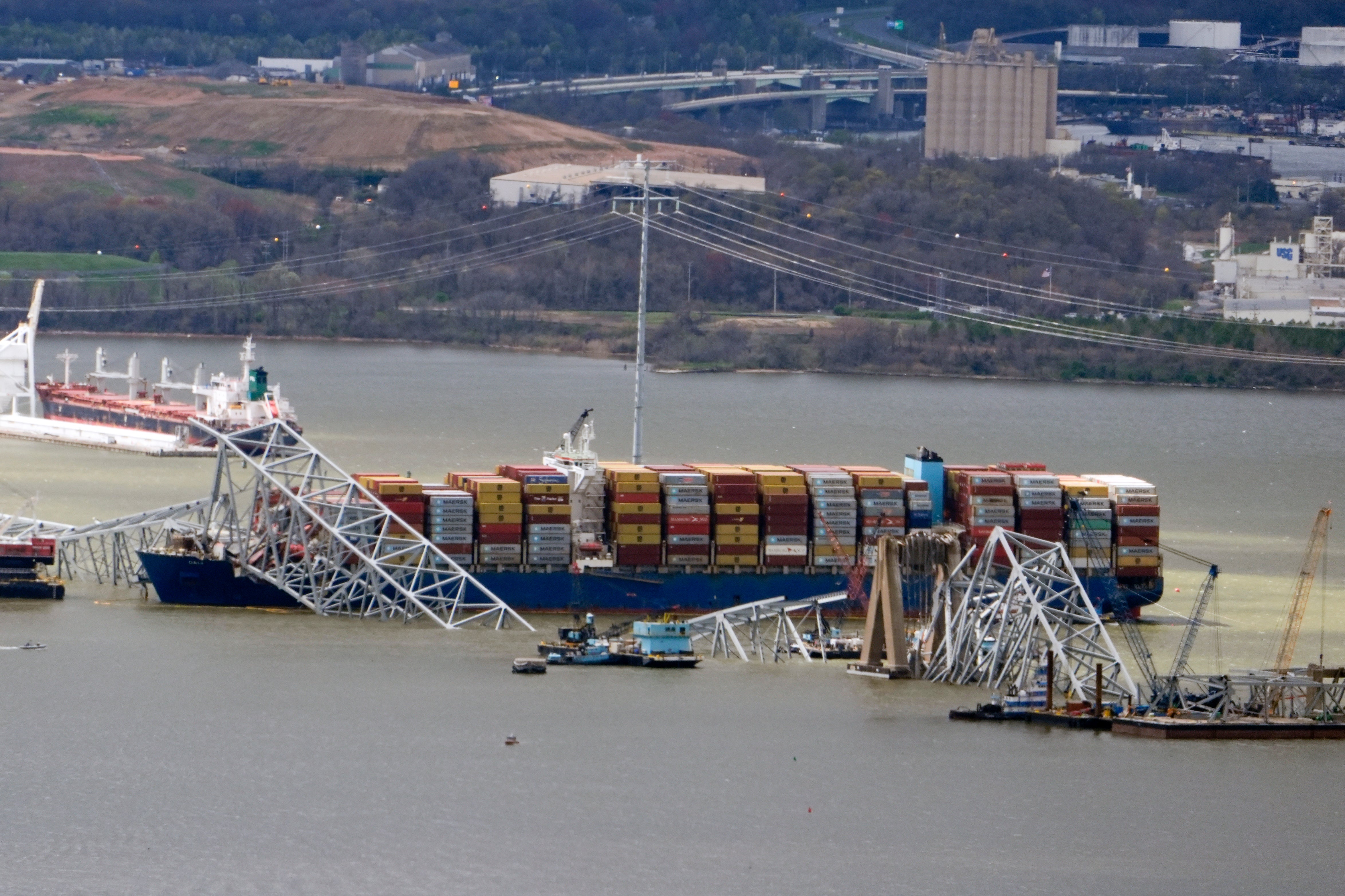 Wreckage of the Francis Scott Key Bridge rests on the container ship Dali