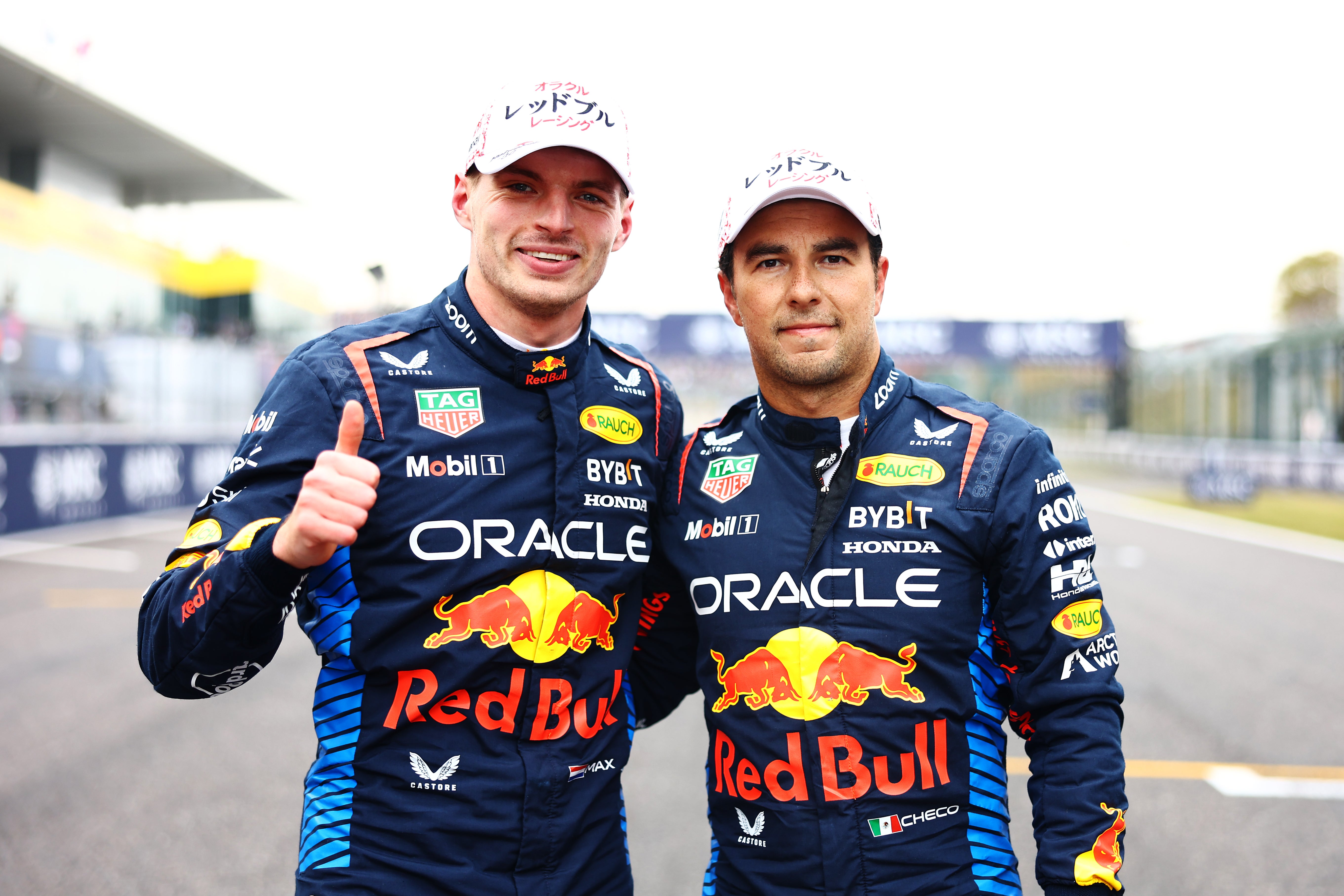 Sergio Perez (right) will stay as Max Verstappen’s teammate for 2025 and 2026