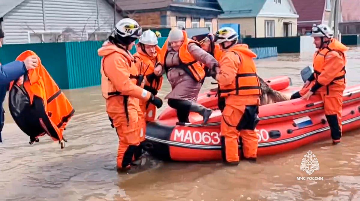 Thousands are evacuated after floods break a dam in the Russian city of Orsk