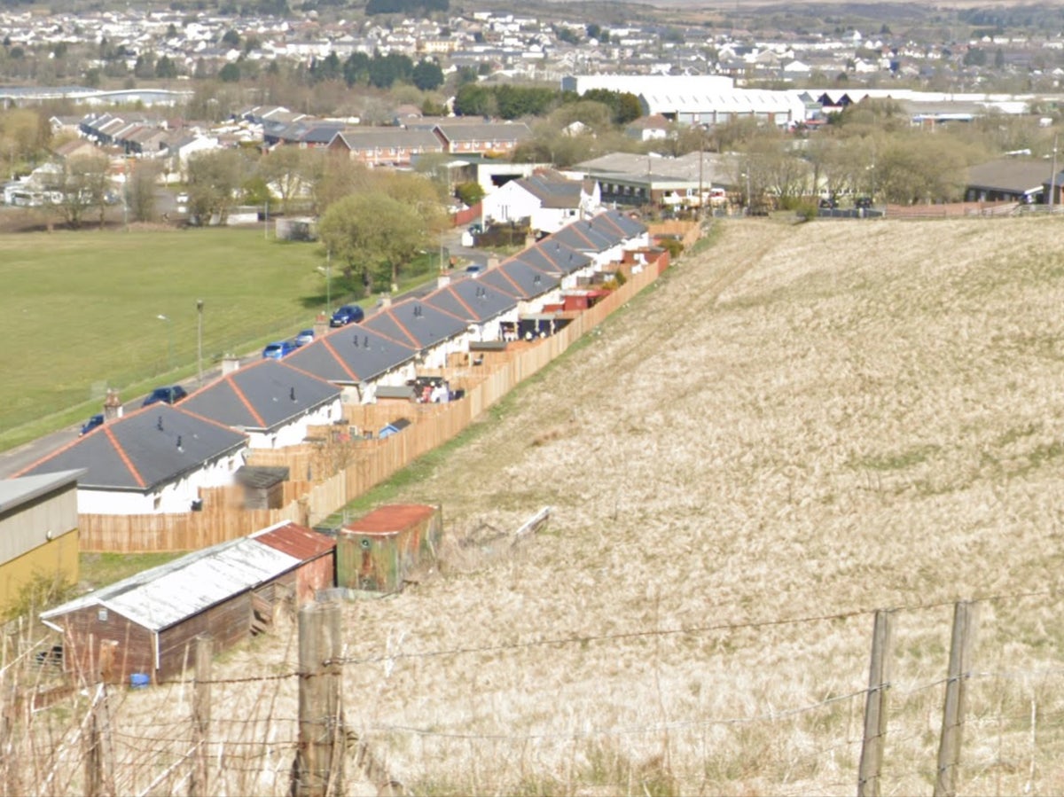 Travellers told to stop digging into Welsh hillside over fears of landslip
