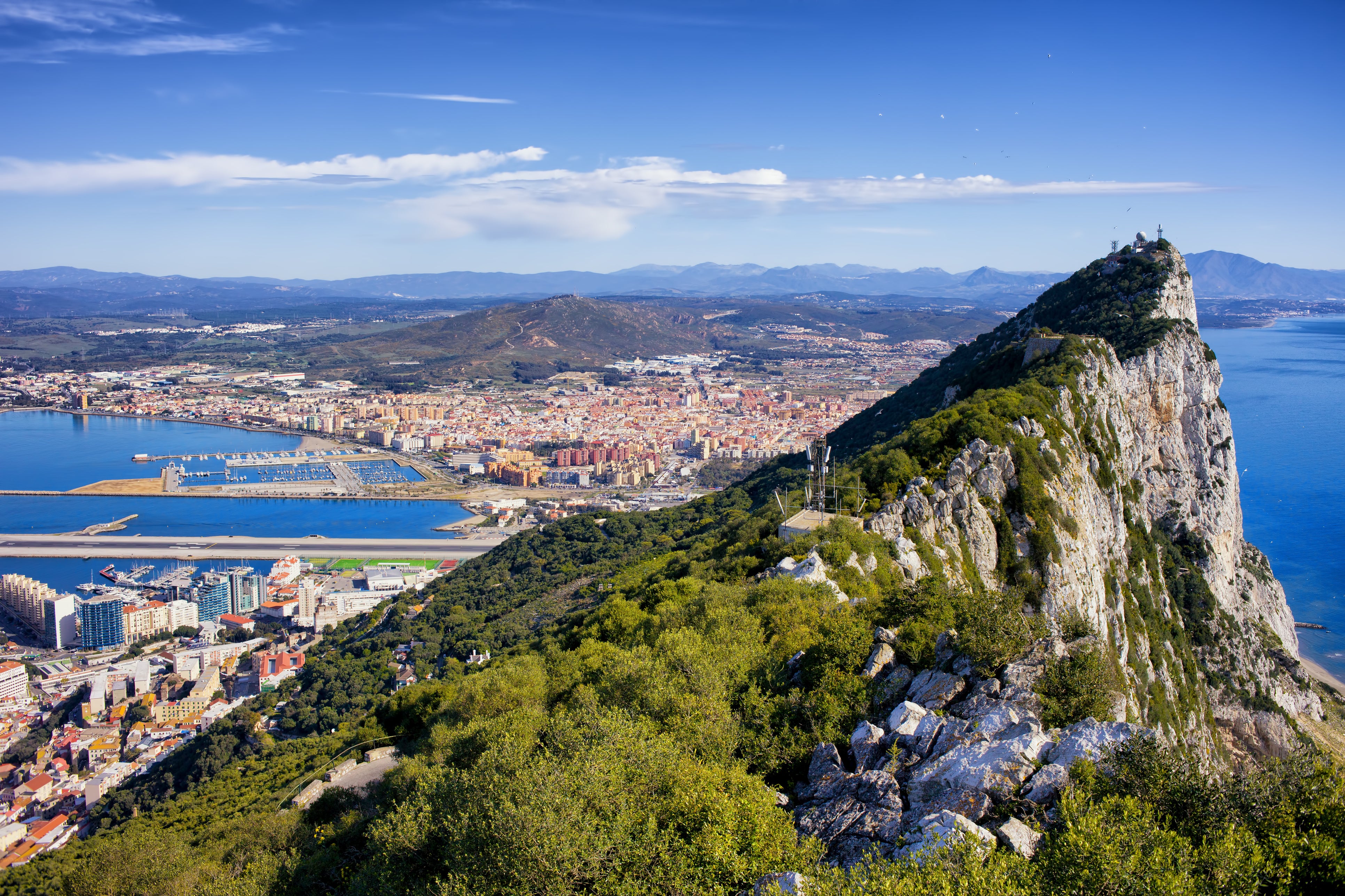 Gibraltar is a British Overseas Territory and city located at the southern tip of the Iberian Peninsula