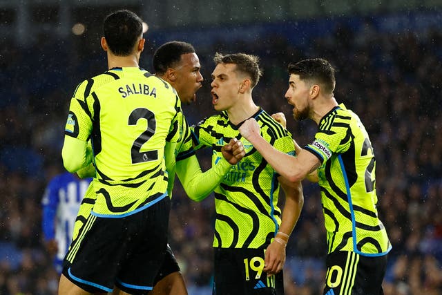 <p>Gabriel Magalhaes (second left) celebrates after blocking a Brighton shot in the 90th minute </p>