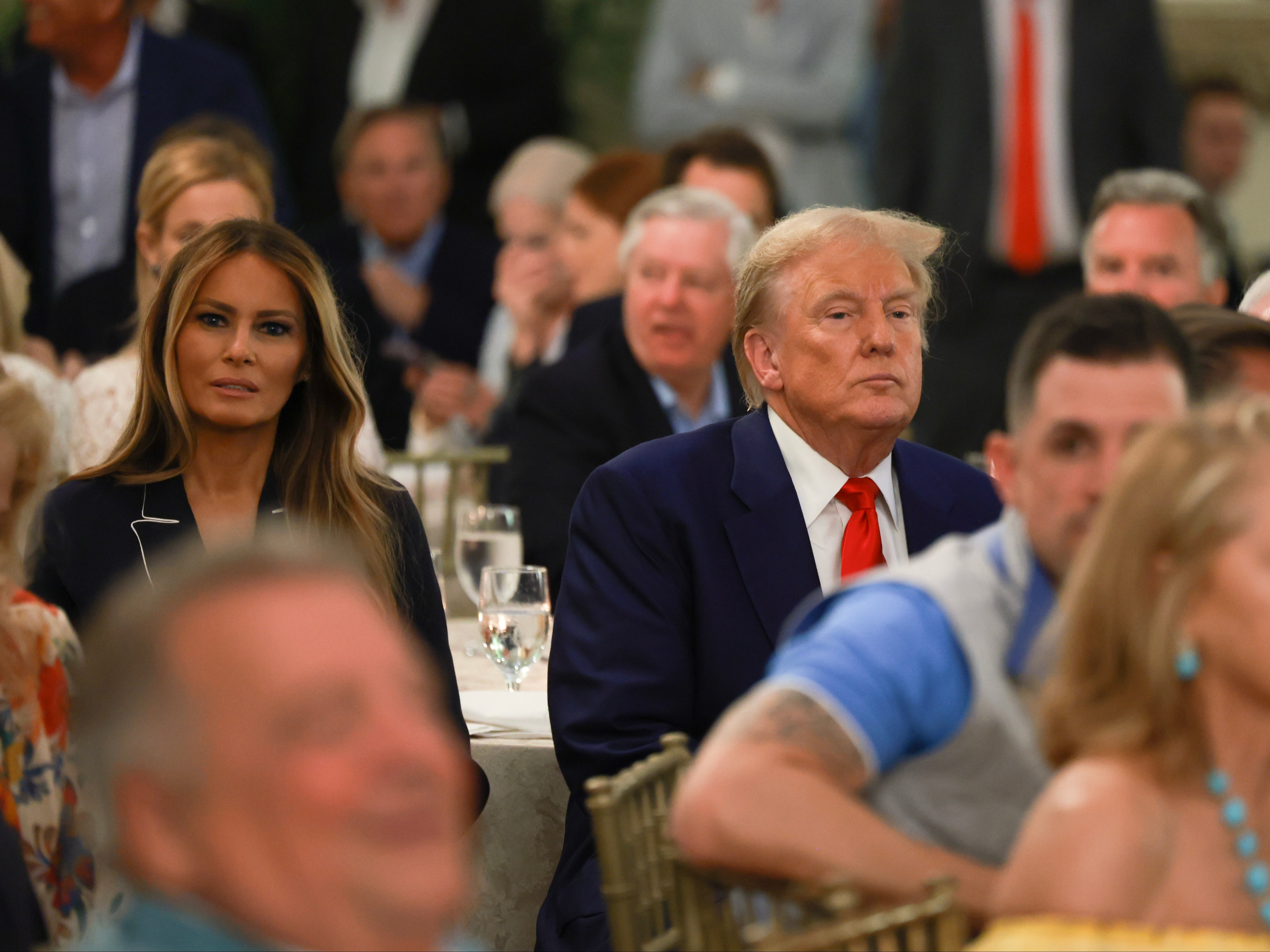 Republican presidential candidate and former President Donald Trump, and Melania Trump, attend a golf awards ceremony at the Trump International Golf Club on March 24, 2024, in West Palm Beach, Florida